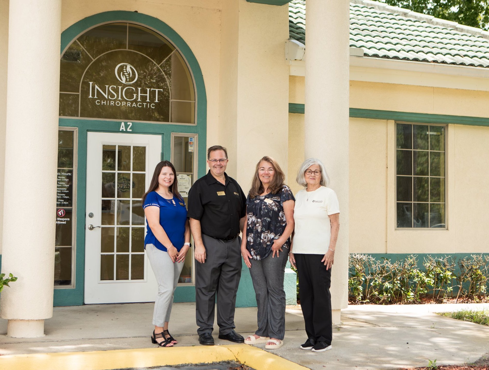 The Insight Chiropractic team outside the practice entrance at 290 Clyde Morris Blvd Ste a-2, Ormond Beach